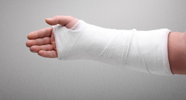 A photo of an arm with a plaster on it.